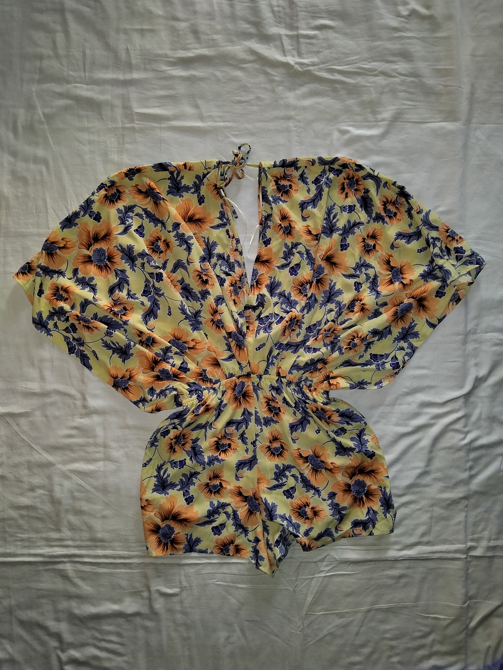 Floral V-Neck Tie-Back Romper in Yellow and Orange
